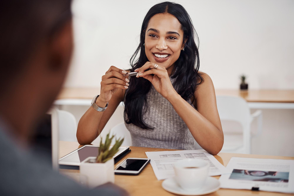 Meeting tech and woman at table for proposal advice and feedback in office woman business advisor and information on documents for project management growth and development in workplace